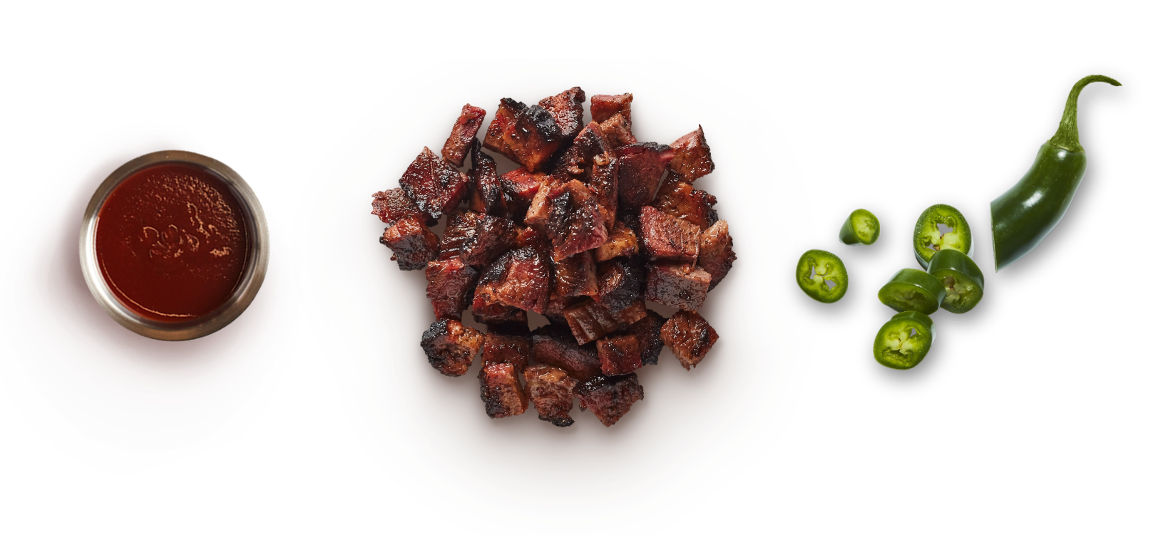 Chipotle’s signature sauce marinade laid next to a pile of hand-chopped Smoked Brisket and a freshly sliced jalapeño pepper.